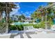 Relaxing pool area with pergola and comfortable seating at 380 Gulf Of Mexico Dr # 525, Longboat Key, FL 34228