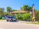Parking lot near beach access with building in background at 411 S Casey Key Rd, Nokomis, FL 34275