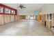 Bedroom with water damage and exposed framing at 411 S Casey Key Rd, Nokomis, FL 34275