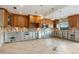 A kitchen undergoing renovation with new cabinets and flooring at 411 S Casey Key Rd, Nokomis, FL 34275