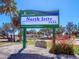 North Jetty Park sign with location details at 411 S Casey Key Rd, Nokomis, FL 34275