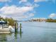 Waterway view with boats docked at the pier at 411 S Casey Key Rd, Nokomis, FL 34275