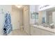 Clean bathroom with toilet, sink, and linen closet at 4142 Central Sarasota Pkwy # 1428, Sarasota, FL 34238