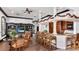 Clubhouse kitchen with bar and seating area at 4142 Central Sarasota Pkwy # 1428, Sarasota, FL 34238