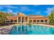 Resort-style pool with surrounding lounge area at 4142 Central Sarasota Pkwy # 1428, Sarasota, FL 34238