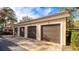 Attached garage with three parking spaces at 4142 Central Sarasota Pkwy # 1428, Sarasota, FL 34238