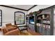 Community library with comfortable seating and built-in shelving at 4142 Central Sarasota Pkwy # 1428, Sarasota, FL 34238