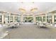 Clubhouse interior with modern light fixtures and seating area at 4363 Kariba Lake Ter, Sarasota, FL 34243