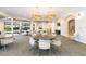 Spacious community room featuring ample seating and large windows at 4363 Kariba Lake Ter, Sarasota, FL 34243