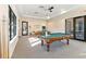 Bright game room featuring two pool tables at 4363 Kariba Lake Ter, Sarasota, FL 34243