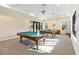 Relaxing game room with two billiard tables and comfortable seating at 4363 Kariba Lake Ter, Sarasota, FL 34243