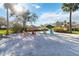 Relaxing sandy area with colorful chairs at 4363 Kariba Lake Ter, Sarasota, FL 34243
