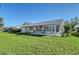 Private patio with seating area overlooking a lush lawn at 4417 Mount Vernon Dr, Bradenton, FL 34210