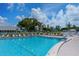 Inviting community pool with lounge chairs and a sunny patio at 4417 Mount Vernon Dr, Bradenton, FL 34210