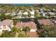 Aerial view of waterfront home with canal access and lush landscaping at 4937 Oxford Dr, Siesta Key, FL 34242
