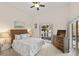 Serene bedroom with a queen bed and water views at 4937 Oxford Dr, Siesta Key, FL 34242