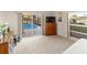 Bedroom with pool access and built-in dresser at 4937 Oxford Dr, Siesta Key, FL 34242