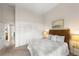 Comfortable bedroom with queen bed and built-in wardrobe at 4937 Oxford Dr, Siesta Key, FL 34242