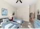 Spacious bedroom with twin beds, ample closet space, and sunny windows at 4937 Oxford Dr, Siesta Key, FL 34242