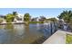 Peaceful canal view showcasing waterfront homes and boat traffic at 4937 Oxford Dr, Siesta Key, FL 34242