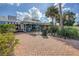 Siesta Key Village shops and palm trees along a brick walkway at 4937 Oxford Dr, Siesta Key, FL 34242