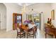 Bright dining room with water views and a chandelier at 4937 Oxford Dr, Siesta Key, FL 34242