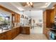 Kitchen with stainless steel appliances and view of living room at 4937 Oxford Dr, Siesta Key, FL 34242