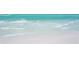 Close up of ocean waves washing ashore on the beach at 4937 Oxford Dr, Siesta Key, FL 34242
