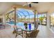 Enjoy waterfront views from this relaxing poolside dining area at 4937 Oxford Dr, Siesta Key, FL 34242