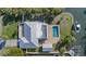 Bird's-eye view of house, pool, and boat dock at 5164 Windward Ave, Sarasota, FL 34242