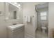 Clean bathroom with vanity, toilet and shower at 5164 Windward Ave, Sarasota, FL 34242