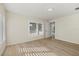 Bright bedroom with a view of the pool and sliding doors at 5164 Windward Ave, Sarasota, FL 34242