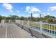 Deck with white railings overlooking the pool at 5164 Windward Ave, Sarasota, FL 34242