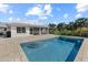 Refreshing pool with large patio and canal views at 5164 Windward Ave, Sarasota, FL 34242