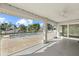 Spacious screened porch with pool and water views at 5164 Windward Ave, Sarasota, FL 34242