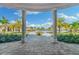 View of resort-style pool from under a covered walkway at 5567 Palmer Cir # 101, Bradenton, FL 34211