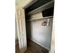 Bedroom closet with double doors and ample shelving at 5938 S Lockwood Ridge Rd, Sarasota, FL 34231