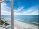 Expansive window showcases stunning ocean and beach views at 603 Longboat Club Rd # 903N, Longboat Key, FL 34228