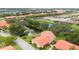 Aerial view of a condo community near a canal at 6542 Draw Ln # 90, Sarasota, FL 34238