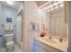 Charming bathroom with a vanity, toilet and shower at 6542 Draw Ln # 90, Sarasota, FL 34238
