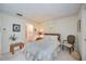 Comfortable bedroom with a full-size bed and ensuite bathroom access at 6542 Draw Ln # 90, Sarasota, FL 34238
