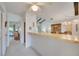 Bright kitchen with wood cabinets, stainless steel appliances, and tiled floor at 6542 Draw Ln # 90, Sarasota, FL 34238