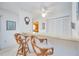 Kitchen features a breakfast bar with seating and a view into the dining area at 6542 Draw Ln # 90, Sarasota, FL 34238