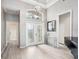 Bright and spacious entryway with double doors and hardwood floors at 7131 Sandhills Pl, Lakewood Ranch, FL 34202