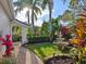 Landscaped entryway with fountain and walkway at 7131 Sandhills Pl, Lakewood Ranch, FL 34202