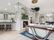 Modern kitchen with white cabinets, granite countertops, and stainless steel appliances at 7131 Sandhills Pl, Lakewood Ranch, FL 34202