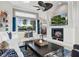 Spacious living area with fireplace and golf course views at 7131 Sandhills Pl, Lakewood Ranch, FL 34202