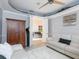 Spacious office with comfortable seating, and access to another room at 7131 Sandhills Pl, Lakewood Ranch, FL 34202
