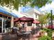 Enjoyable outdoor seating area at a restaurant at 7131 Sandhills Pl, Lakewood Ranch, FL 34202