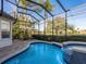 Screened pool and spa overlooking the golf course at 7131 Sandhills Pl, Lakewood Ranch, FL 34202